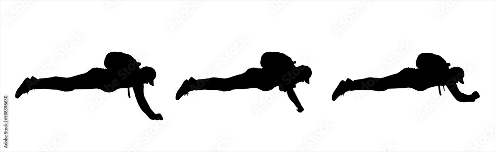 Paratroopers. A parachute jump that hasn't opened yet. Men in tracksuits, with backpacks on their backs and sneakers on their feet, in a lying position. Guys of large physique lie belly down. Paratroopers. A parachute jump that hasn't opened yet. Men in tracksuits, with backpacks on their backs and sneakers on their feet, in a lying position. Guys of large physique lie belly down.