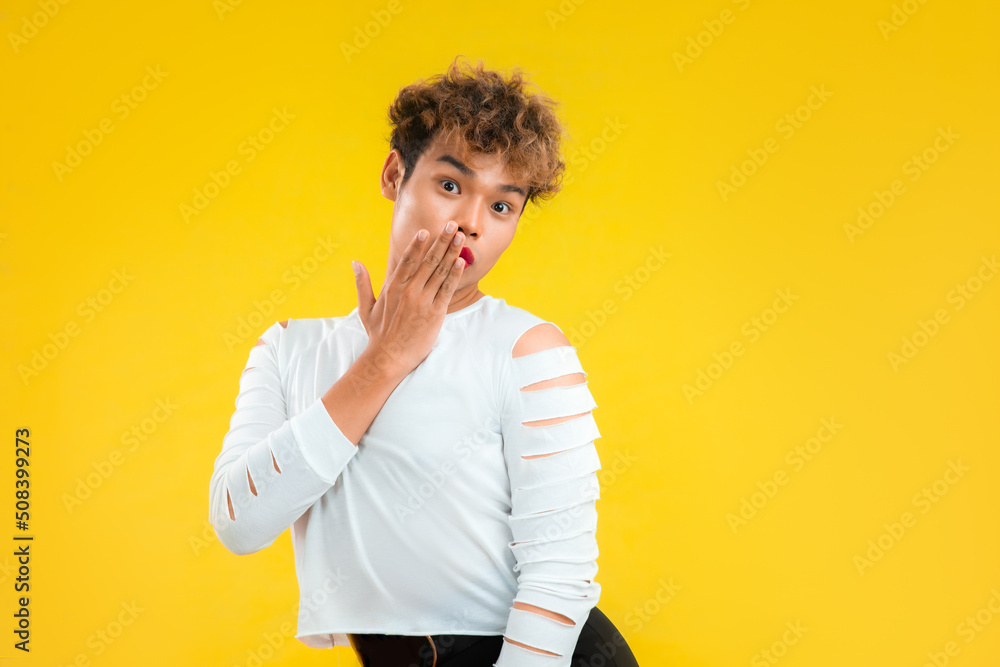 photo of a pretty gay man with make up and white shirt. Transgender male LGBTQ+ concept photo of a pretty gay man with make up and white shirt. Transgender male LGBTQ+ concept