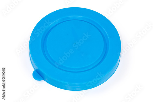 Blue plastic lid for glass jars on a white background
