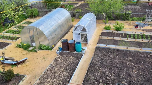 Wallpaper Mural View from the height of greenhouses and vegetable beds in a small farm. Garden from above. Torontodigital.ca