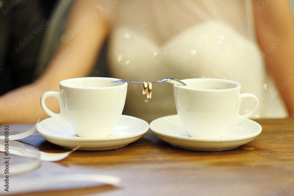 Bride and groom's Coffee time, coffee break.Hand in hand