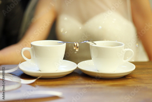 Bride and groom's Coffee time, coffee break.Hand in hand