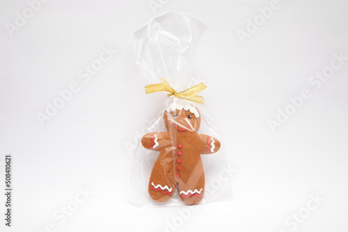 Gingerbread classic christmas cookie in gift pack on whte background