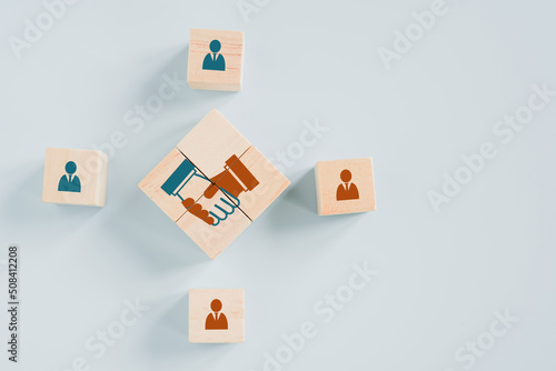 wooden cube block with hand shake icon in middle for teamwork, brainstorming, cooperation for business growing concept