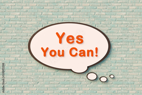 Yes you can - Cartoon speech bubble. Orange letters against a slightly bluish brick wall. Motivation, saying and inspiration concept. 3D illustration