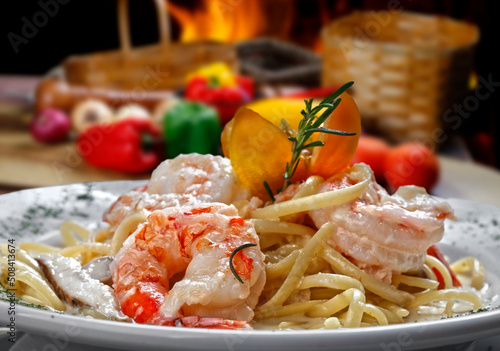 large shrimp with pasta, haute cuisine photo