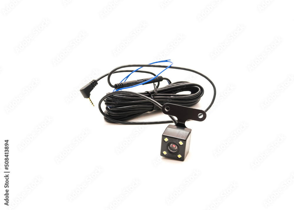 Backup camera with wiring and plug isolated on white background Backup camera with wiring and plug isolated on white background