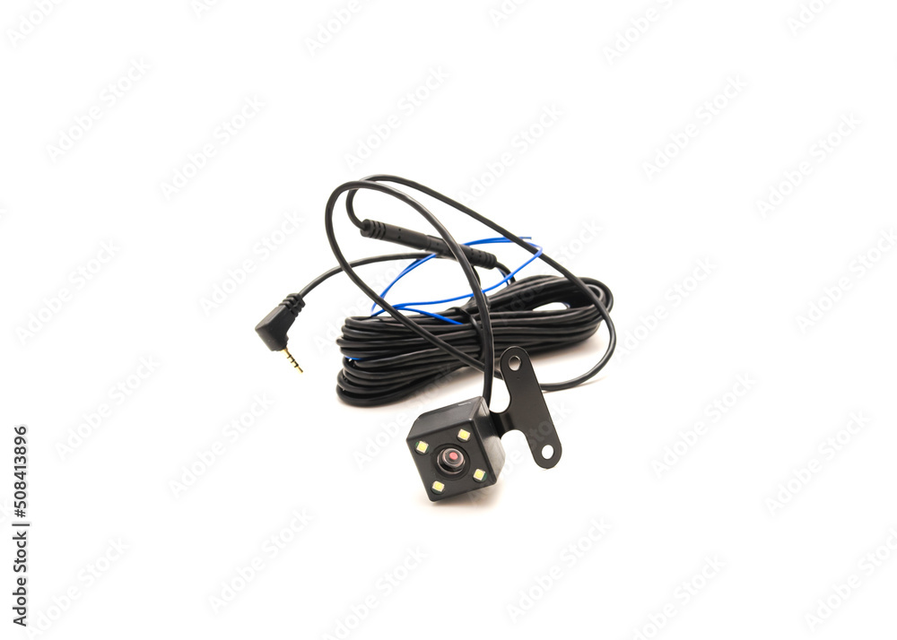 Backup camera with wiring and plug isolated on white background Backup camera with wiring and plug isolated on white background