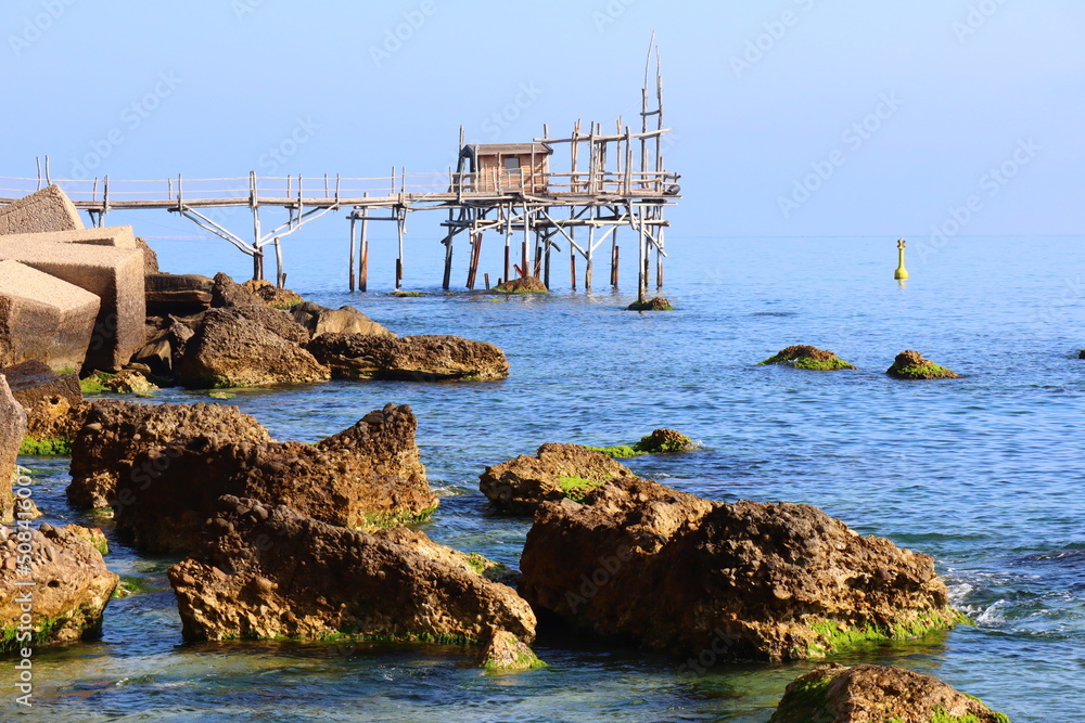 Coast of the Trabocchi, Trabocco in Marina di San Vito Chietino. The Trabocco is a traditional wooden fishing house on pilework typical of Adriatic sea, coast of Abruzzo, Italy