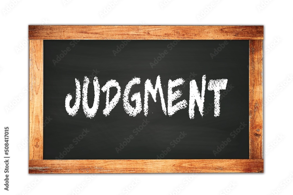 Obraz premium JUDGMENT text written on wooden frame school blackboard.