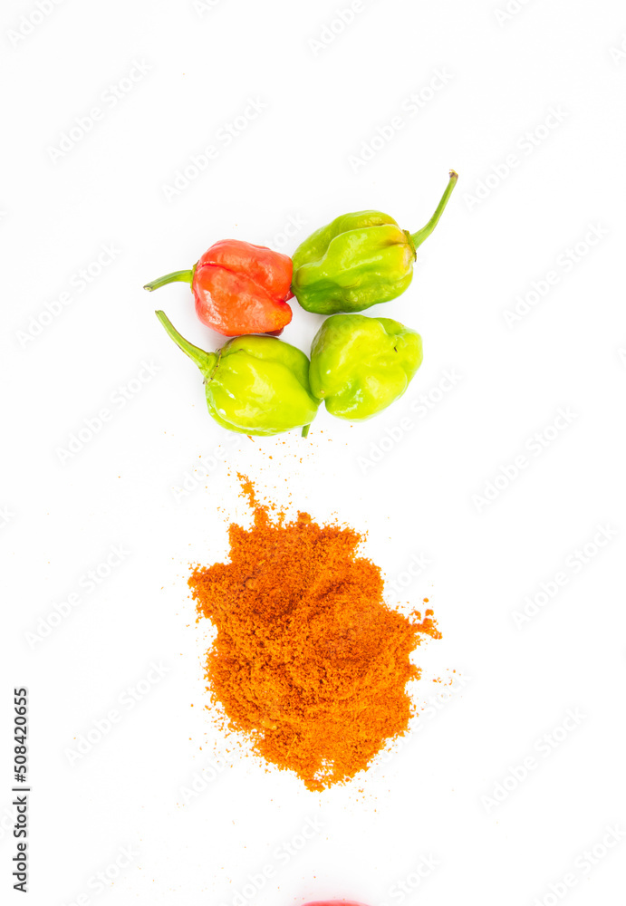 Spicy naga chili with chili powder isolate on white background, top view