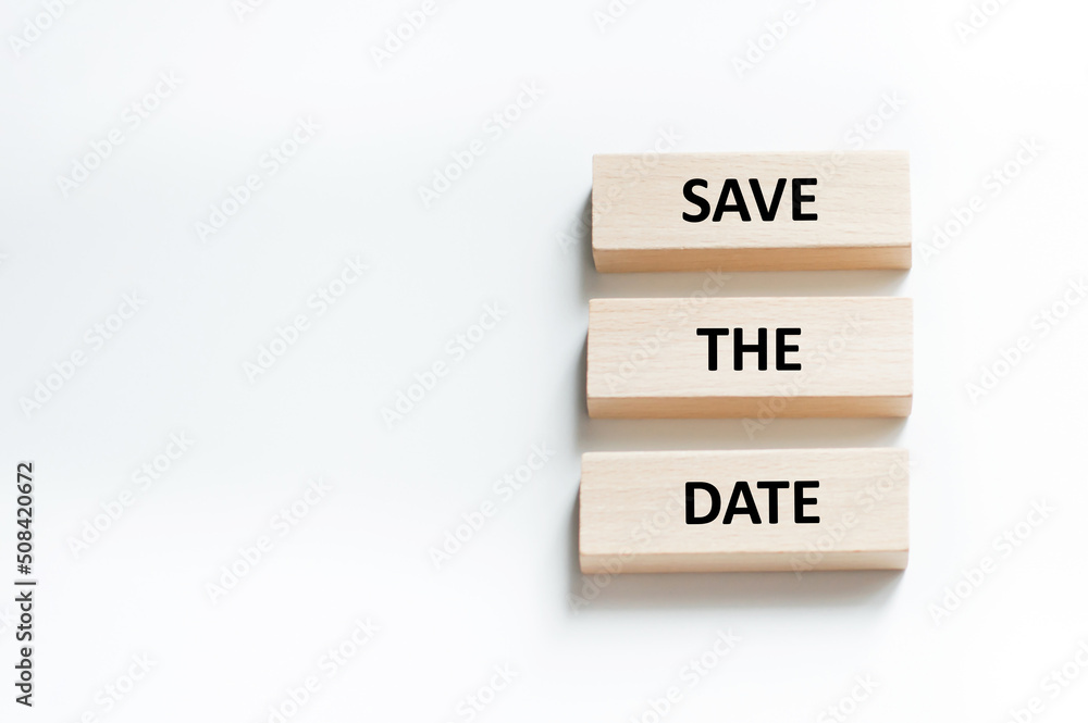 Save the Date word written on wood block. Save the Date text on table, concept Save the Date word written on wood block. Save the Date text on table, concept