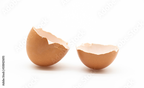 Broken egg skin over on white background.