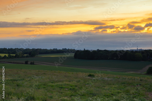 Wallpaper Mural A long exposure during a summer storm, creating movement in the clouds and crops on the agricultural fields during a sunset just outside of Maastricht in Wolder with views on Belgium.  Torontodigital.ca