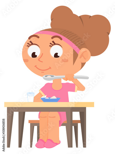 Happy child eating. Girl sitting at table. KId nutrition
