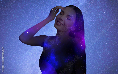 фотографія Double exposure of beautiful woman and starry sky