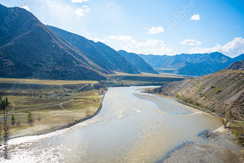 Confluence of Chuya and Katun rivers in Altai mountains, Siberia, Russia. Spring landscape. Famous tourist destination photo