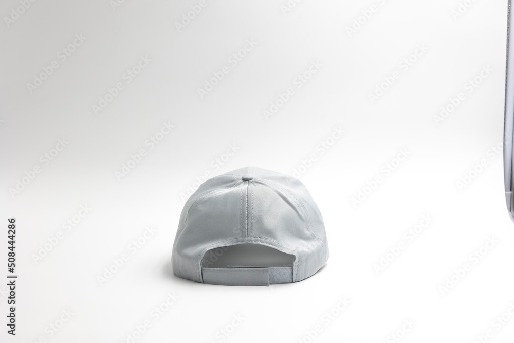 one light grey plain cap for men isolated on a white background, back view