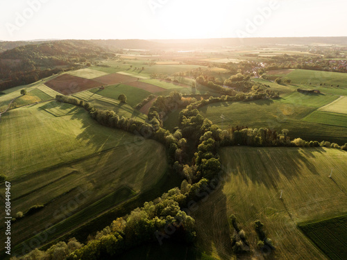 Kocher-Jagst im Sonnenuntergang aus der Luft fotografiert photo