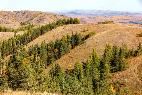 picturesque spurs of the Nurali ridge in the Ural Mountains in the Republic of Bashkortostan on an autumn day. photo