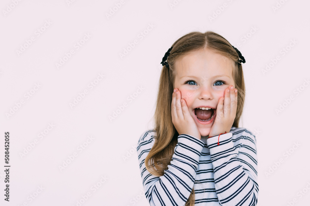 Portrait of little surprised girl excited scared on white background Portrait of little surprised girl excited scared on white background