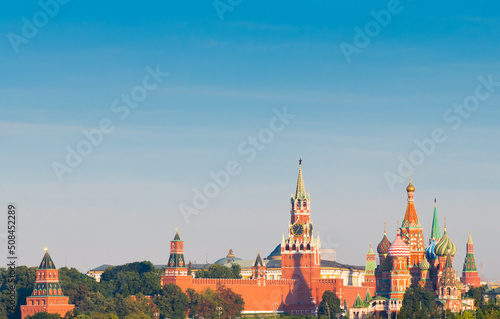 Spasskaya Tower and Cathedral of Vasily the Blessed (Saint Basil's Cathedral) on Red Square. Sunny summer morning. Moscow. Russia