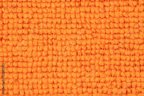Closeup of orange Microfiber clothes texture for background