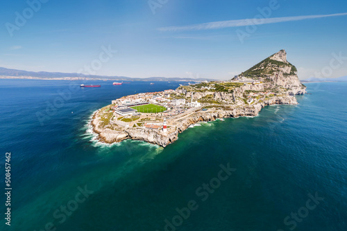 Spectacular view of Gibraltar peninsula with soccer field surrounded by the Mediterranean sea