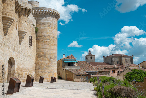 Vista de la villa de Fuentes de Valdepero con las murallas de su castillo medieval siglo XV en la provincia de Palencia, España photo