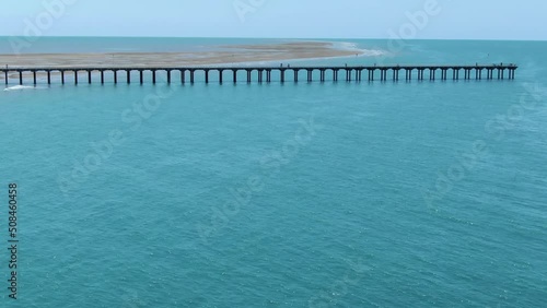 People walking on Urangan pier during, Hervey Bay in Queensland, Australia. Aerial drone view photo