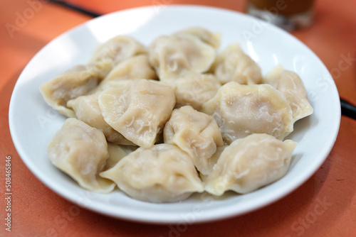 Close up a plate of traditional old Beijing dumplings.