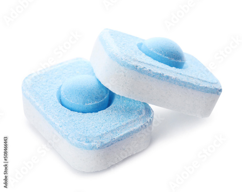 Two water softener tablets isolated on white