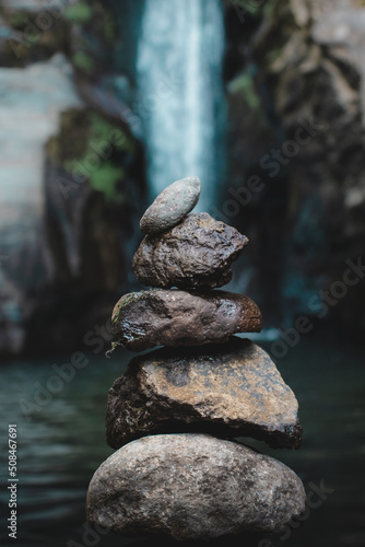 Photography stones in front of a waterfall, Azores