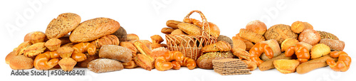 Panoramic photo fresh bread and variety buns isolated on white