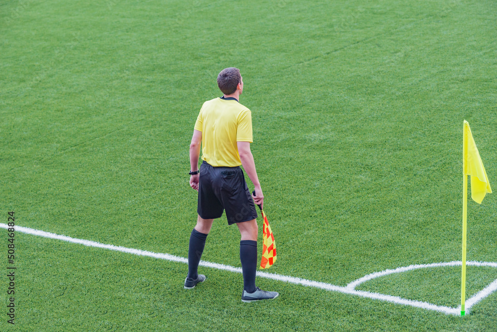 Referee from the sidelines.
