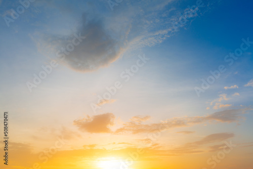 Fototapeta Naklejka Na Ścianę i Meble -  Orange sky and clouds background,Background of colorful sky concept, amazing sunset with twilight sky and clouds