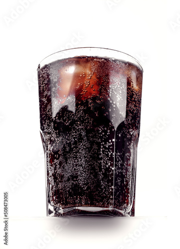 Glass of drink on white background isolated
