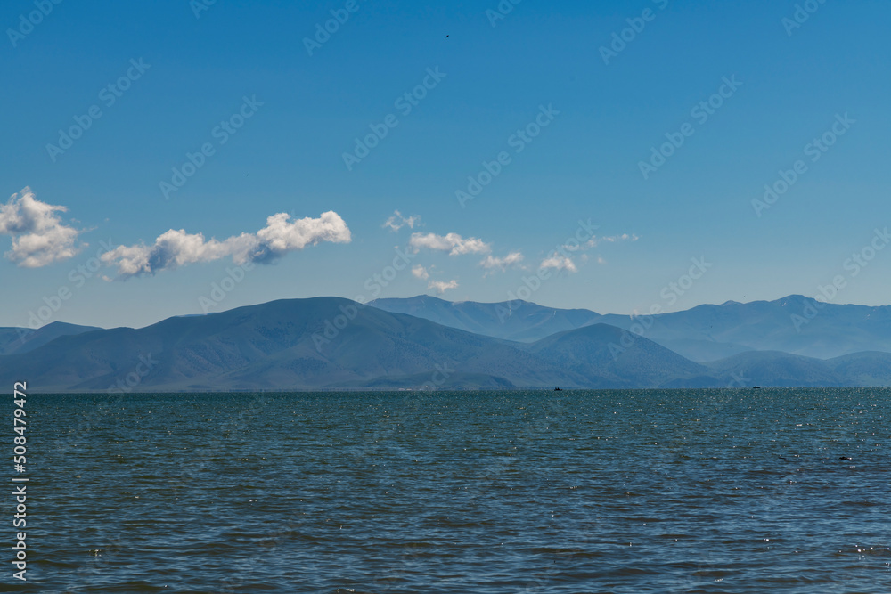 Mountain and lake in the summer day