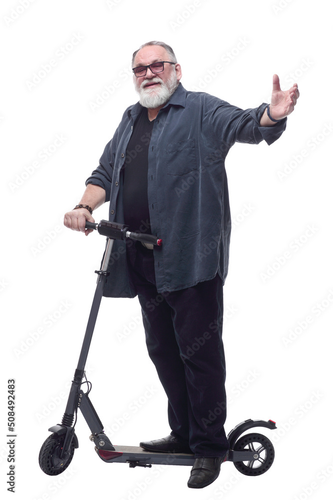 bearded man with an electric scooter looking at you. bearded man with an electric scooter looking at you.
