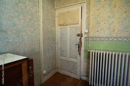 Slum landlord rental. Disgusting door. Dirty.