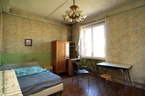 Slum landlord rental. Insalubrious bedroom.