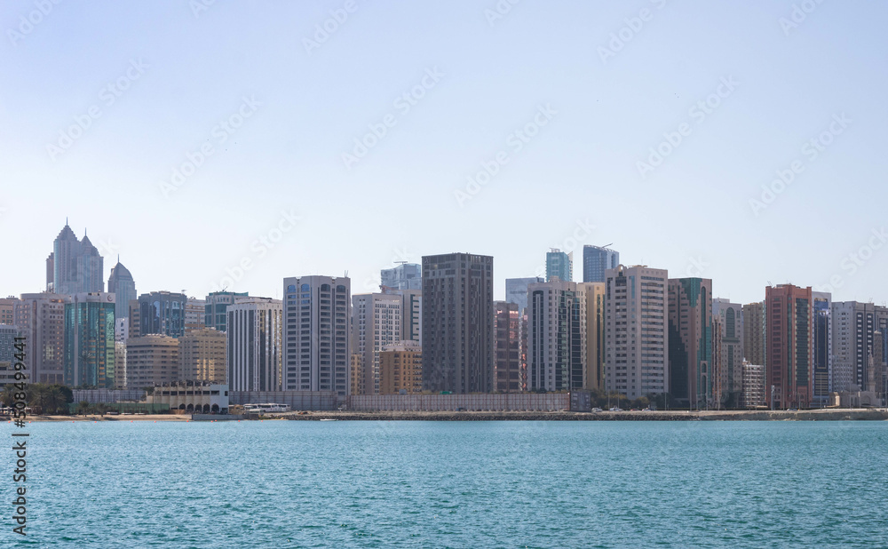 Water and Abu Dhabi  skyline in the background, UAE
