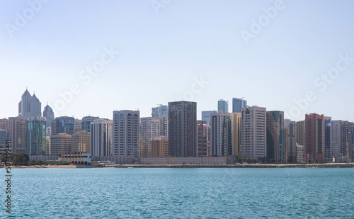 Water and Abu Dhabi skyline in the background, UAE
