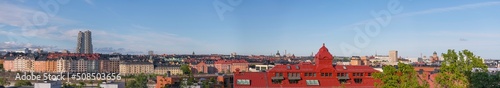 Evening panorama view of roofs and dorms of buildings and the skyscrapers Twin Tower in the district Vasa Stan a sunny summer day in Stockholm