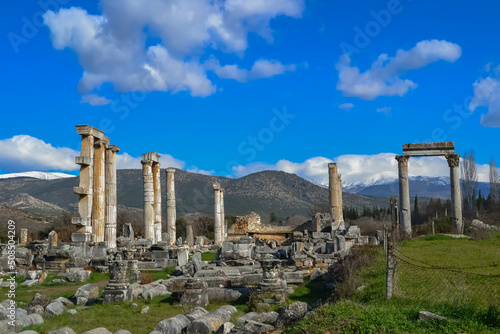 Distant view of the ancient city of Aphrodisias. Historical ruins and ancient columns.