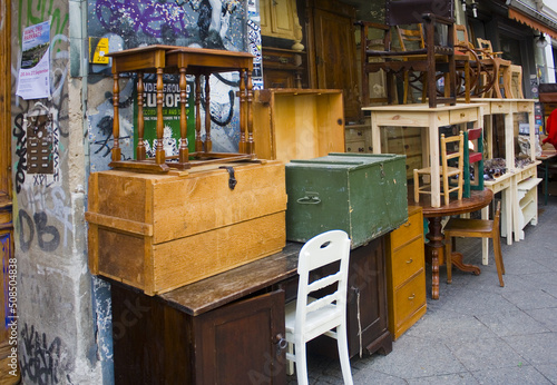 Vintage furniture and antiques in second hand store in Kreuzberg district in Berlin photo