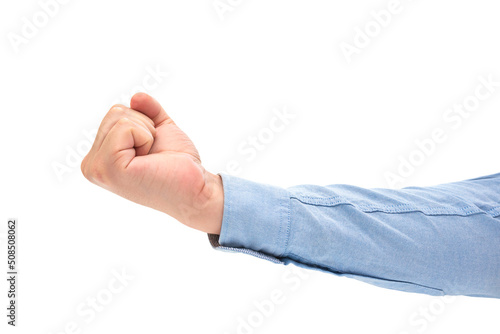 Male clenched fist isolated on white background. Hand of a man in a blue shirt close-up photo