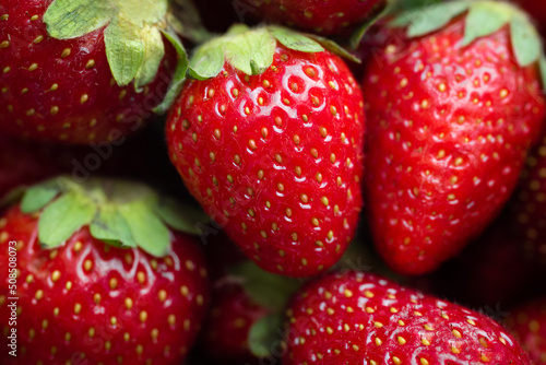 Background of freshly picked strawberries close-up. Fruit background, Fresh organic berries