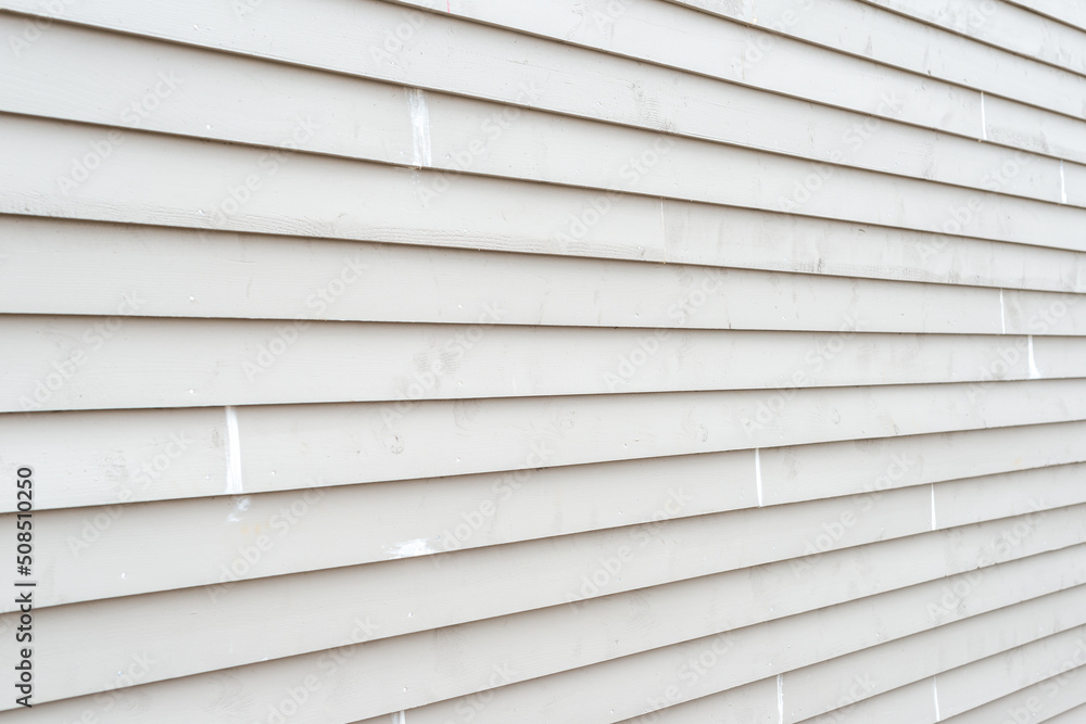 Fotografia do Stock The exterior of a clean white narrow wooden