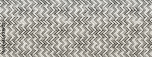 Abstract seamless white gray grey modern mosaic porcelain stoneware cement subway tile, patchwork laid in a herringbone pattern texture background banner panorama